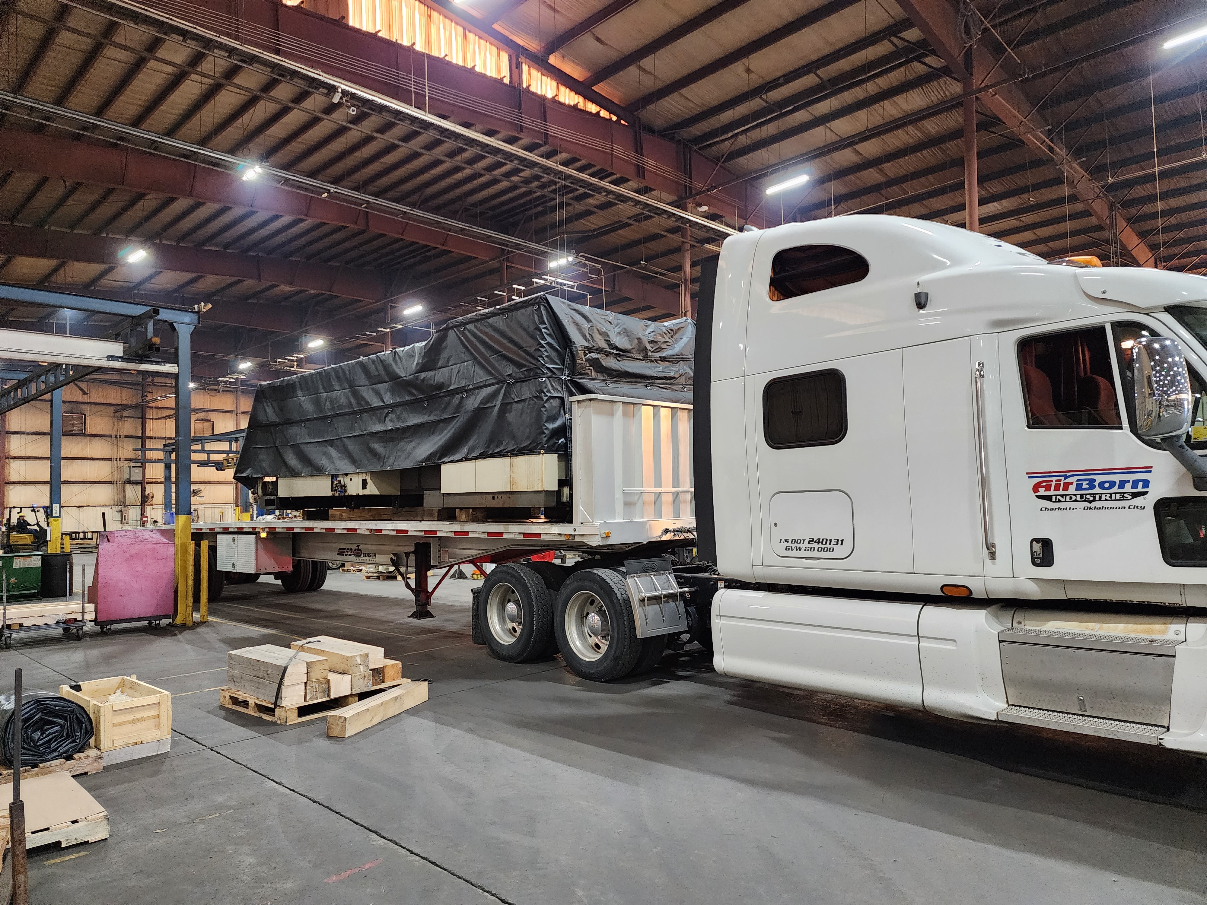 Freight truck positioned for loading fabricated equipment at AirBorn Manufacturing.