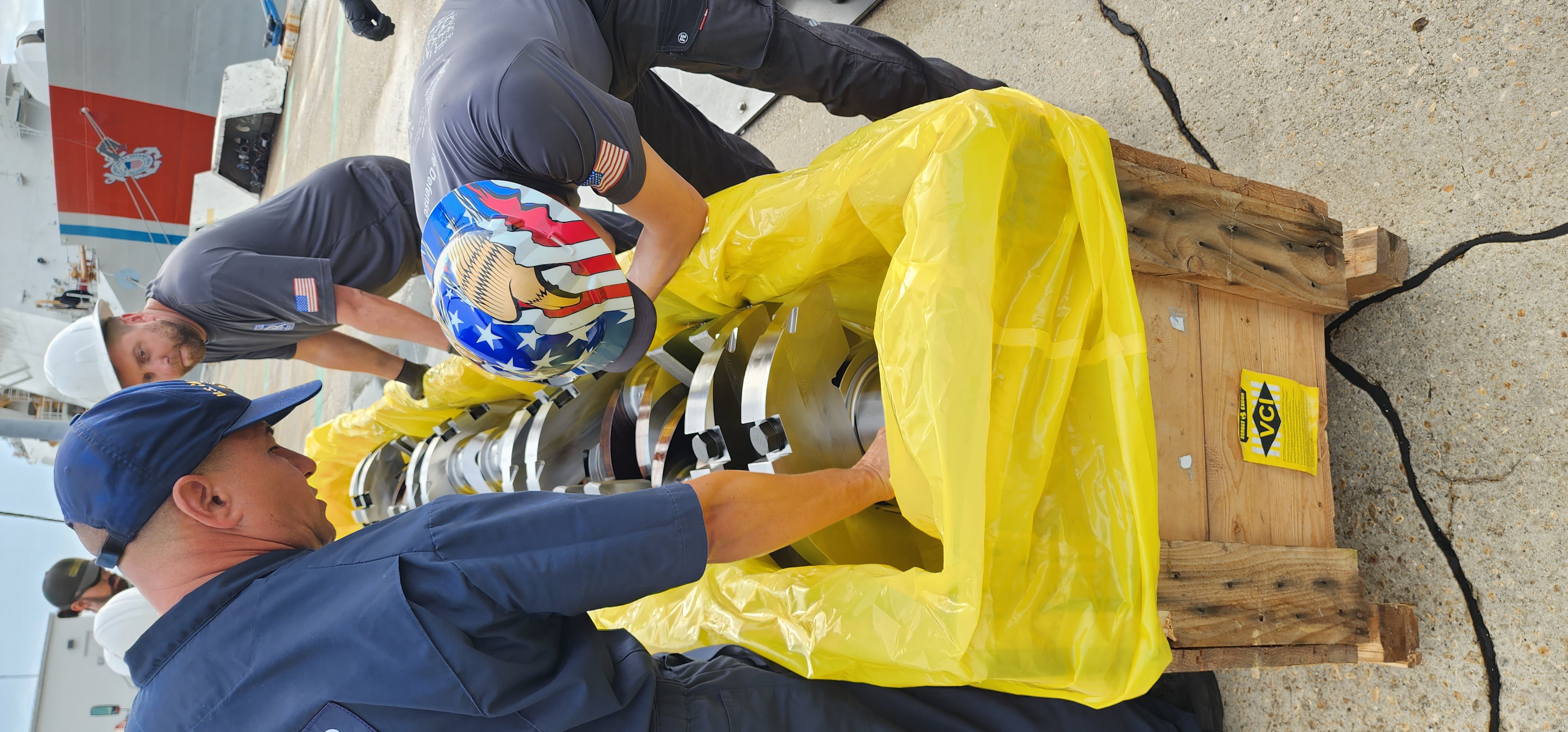 Field assembly of a machined metal shaft component with protective handling.
