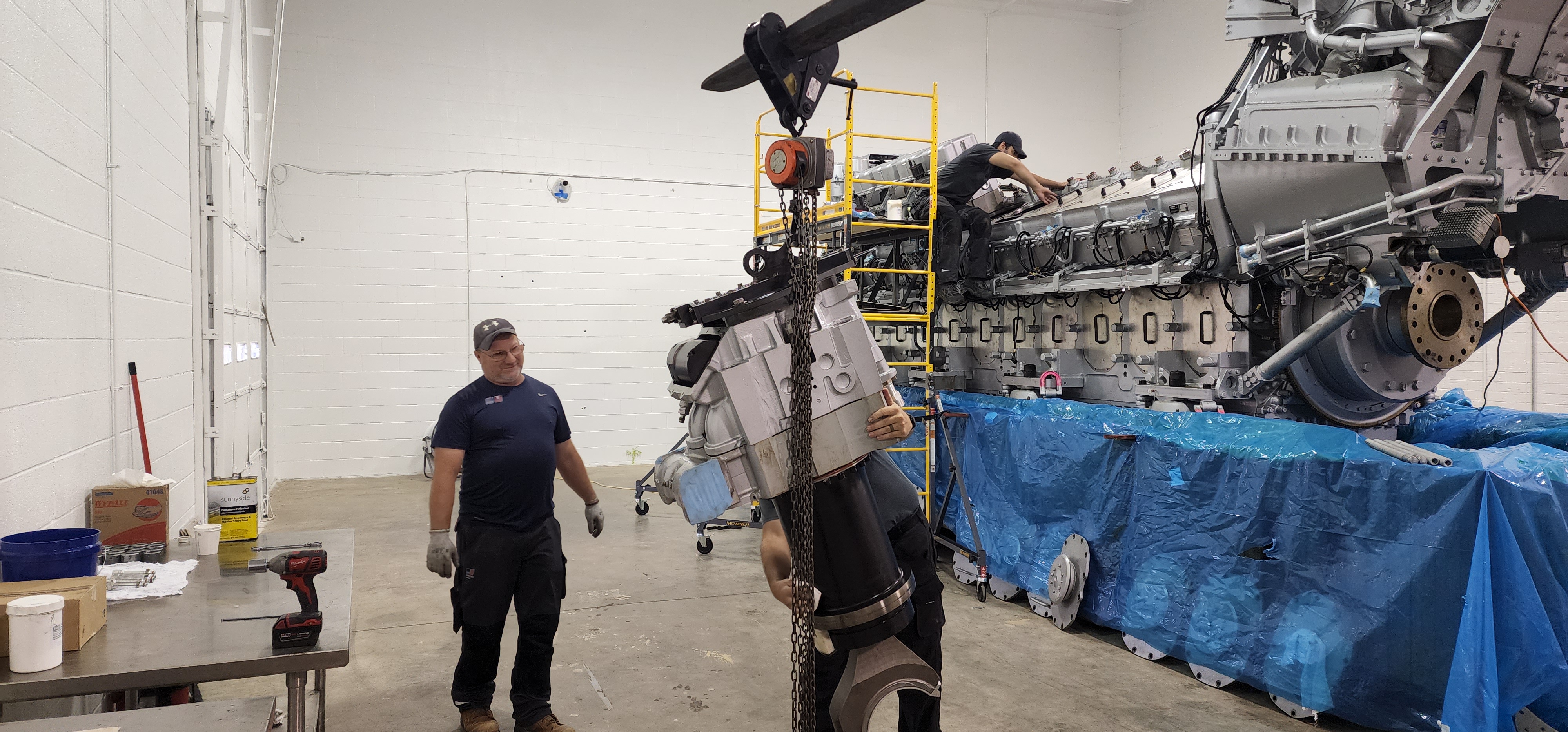 Industrial engine component prepared for lifting with shop support equipment.