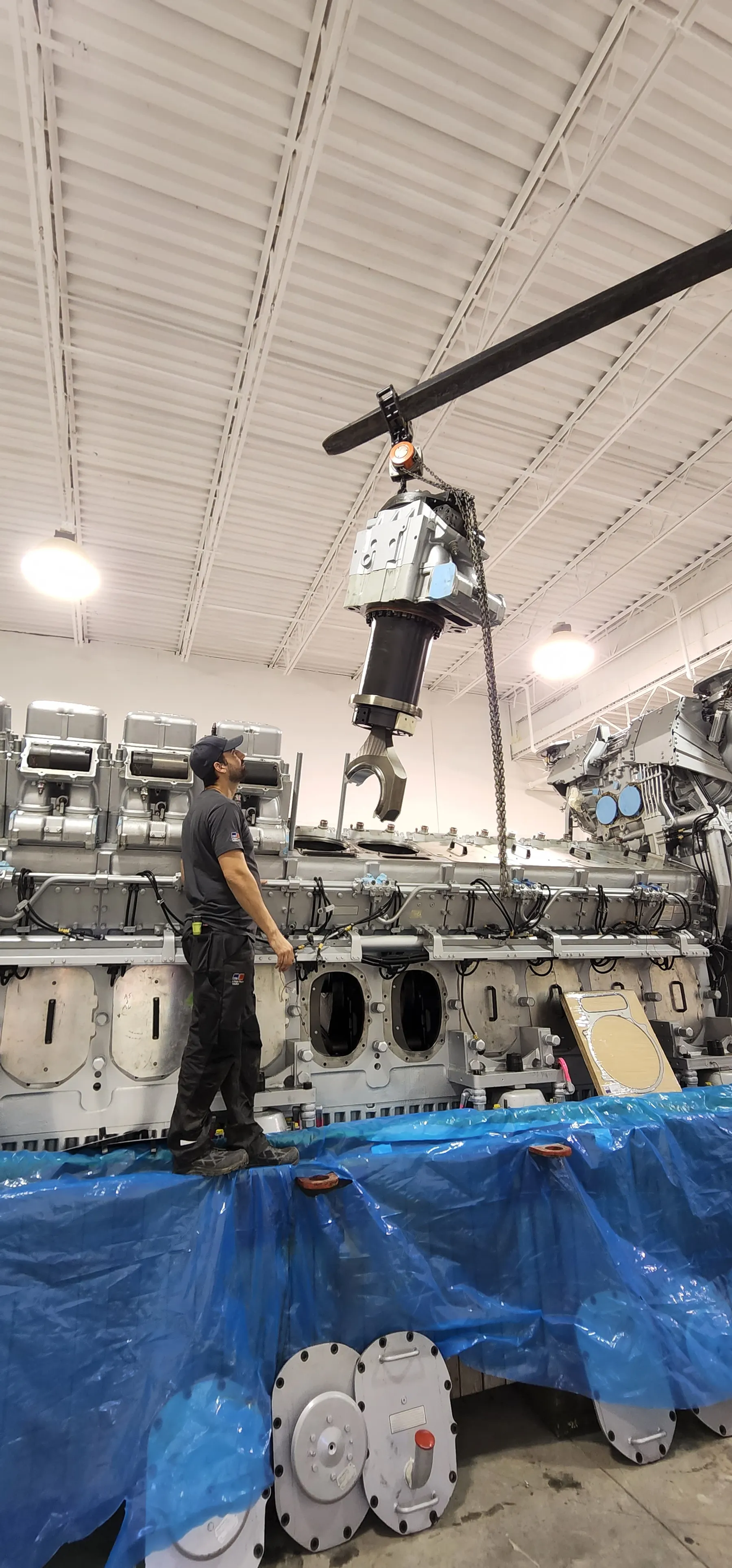 Large engine component installation detail viewed from below the assembly.
